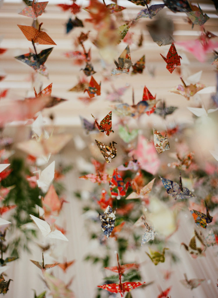 Sara's grandmother handmade each of the 1,000 origami cranes made of Japanese paper.  (Photo by Liz Banfield)