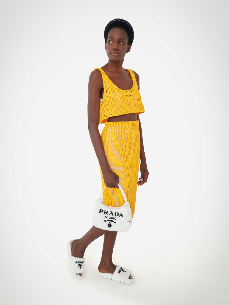 Prada top, $715; Prada skirt, $1,100; Prada bag, $1,050; Prada shoes, $800