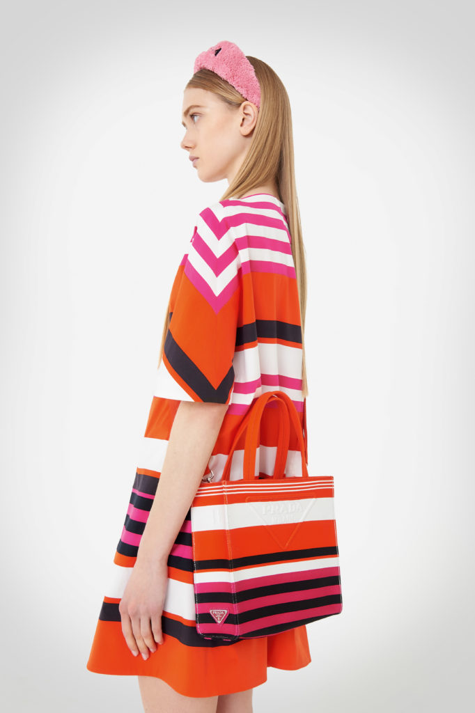 Prada dress, $2,120; Prada headband, $460; Prada Bag, $1,650