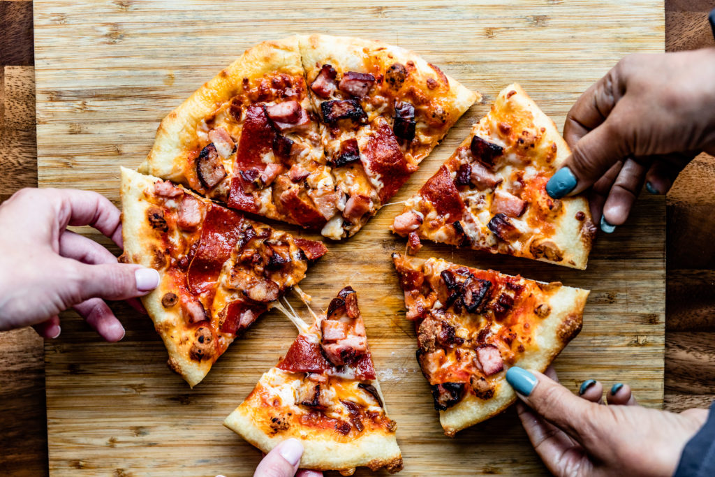 Pizzas straight from the oven at NoPo Café, Market & Bar (Photo by Kirsten Gilliam)