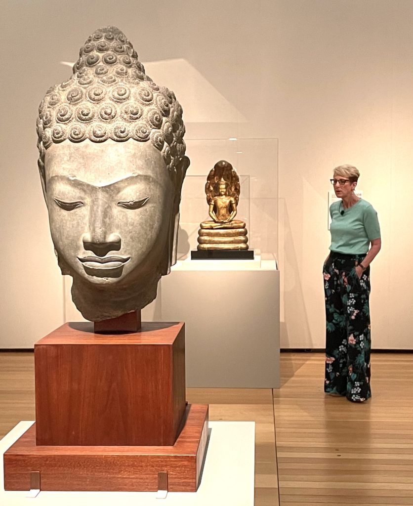 Curator Jennifer Casler Price unfolds the exhibit. (Photo by Courtney Dabney).