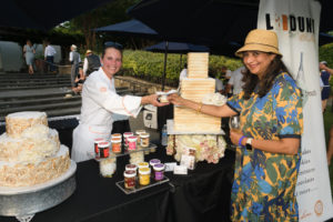 Chef Dunia Borga of La Duni Baking Studio serves dessert to Monica Narula. (Photo by Dallas Arboretum/Steve Foxall)