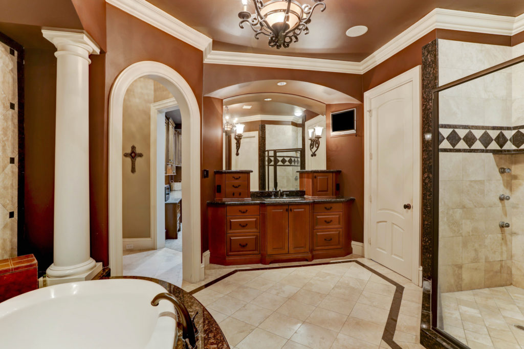 His bath in the primary suite. (Photo by TK Images)