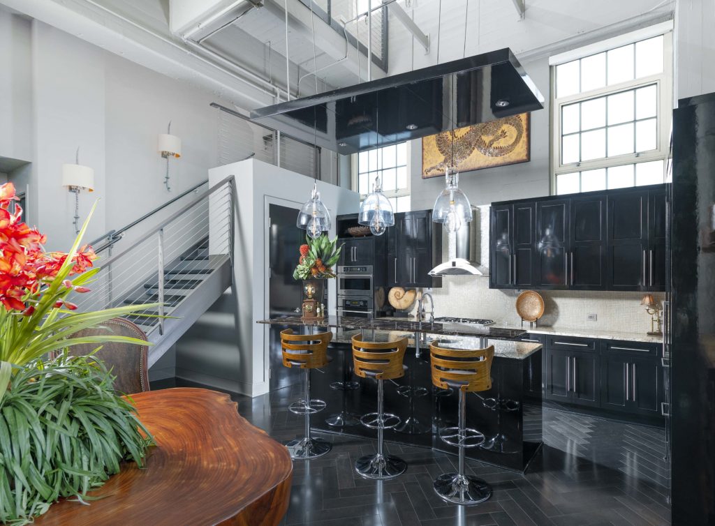 Elliman – Modern and glamorous kitchen in Montgomery Plaza Penthouse. Courtesy of Piassick Photo.