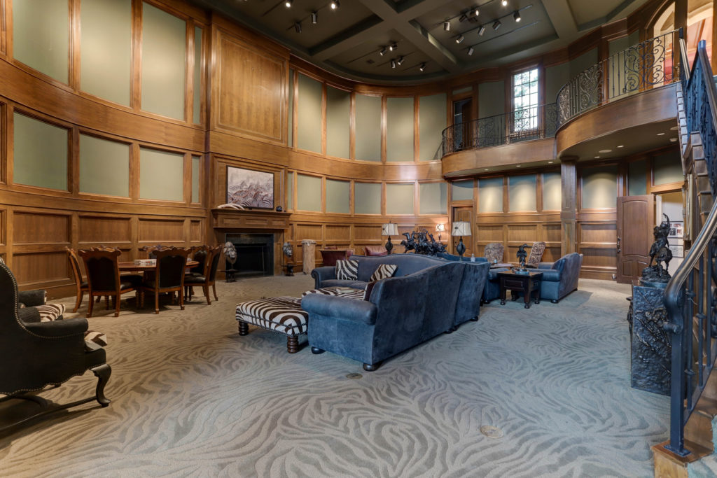 The trophy room boasts 28 foot ceilings and ample room for entertaining. (Photo by TK Images)