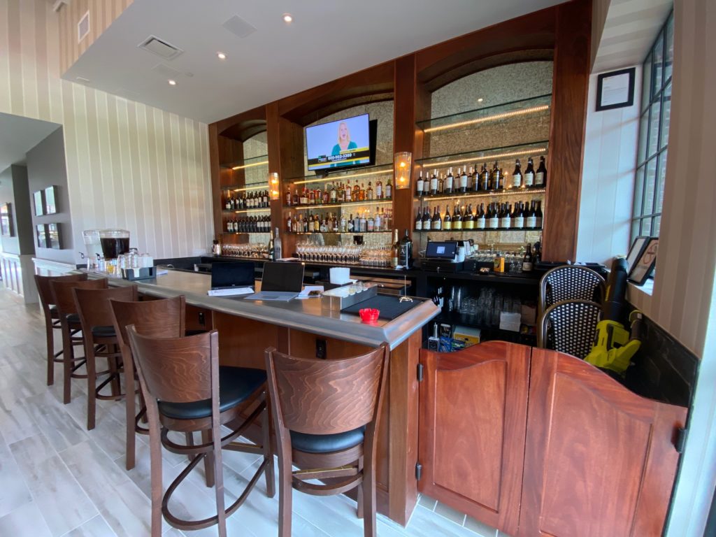 The cozy bar at NoPo Café, Market & Bar on North Post Oak is sure to be a popular watering hole for the neighborhood. (Photo by Shelby Hodge)