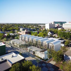 PS1200 – aerial view of apartments with retail and restaurant on ground level