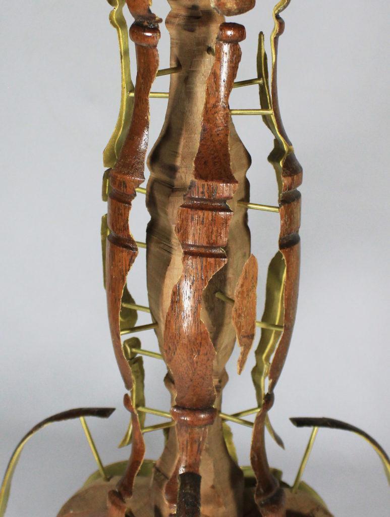 For "Skinned Table," Joyce Lin used a razor blade to lift the veneer, which she mounted on  brass pegs.