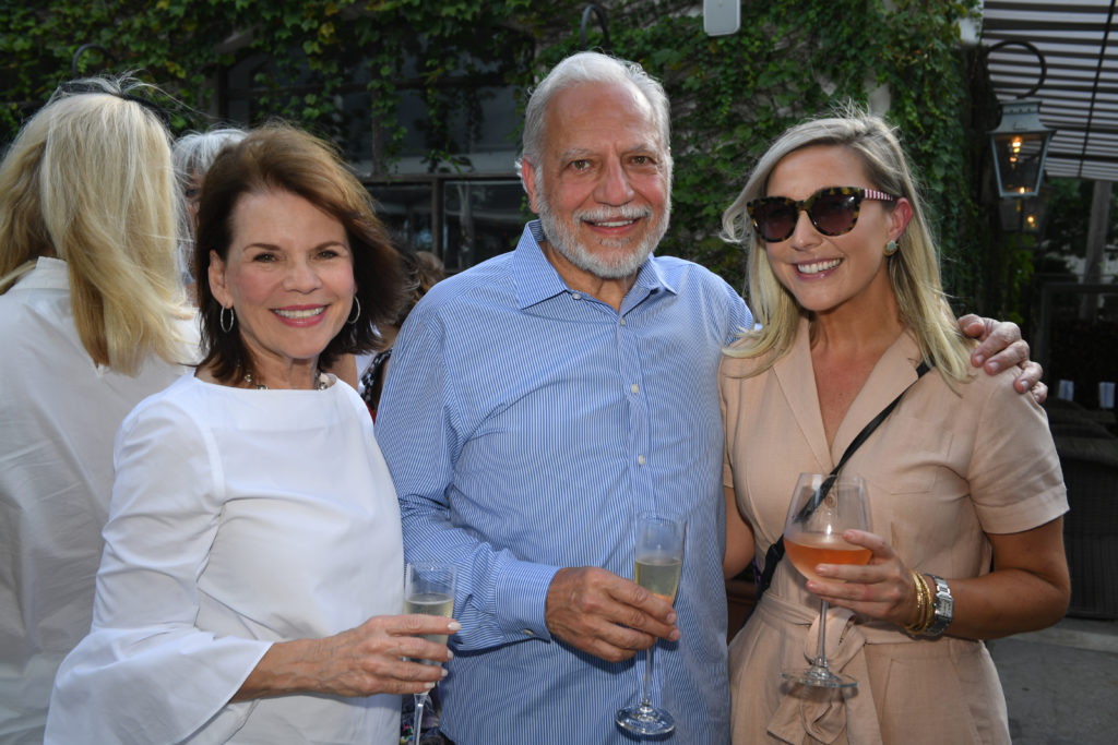 Sharon Ballas, Buck Ballas, Meg Greenwood Rife at the Greenwood King celebration at Tiny Boxwood's (Photo by Jack Opatrny)