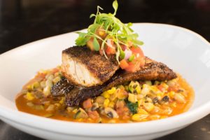 Fitzgerald – Blackened redfish atop Mexican chorizo succotash