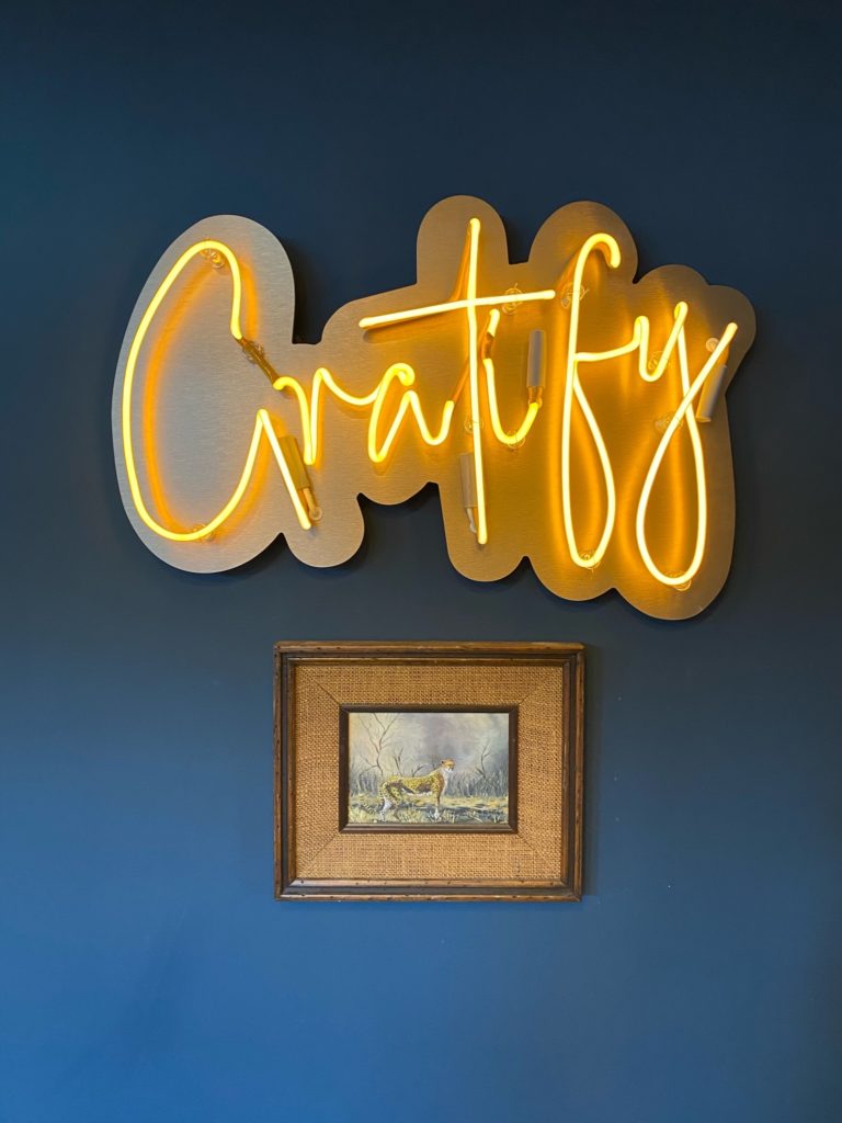 Gratify in neon lights the cozy lounge in the West University restaurant.