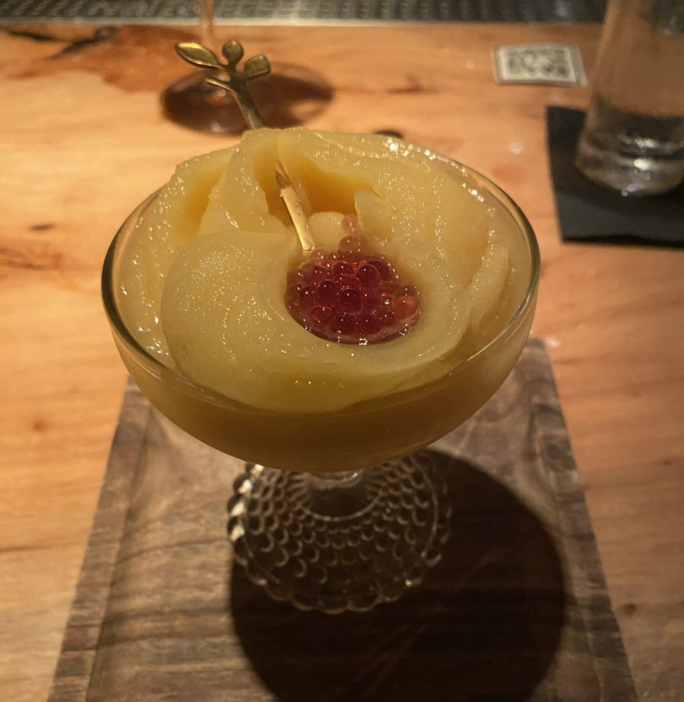 The Only Fans cocktail at Apothecary is a frozen creation of tequila, passionfruit, lemon, and cassis "caviar. (Photo by Megan Ziots)