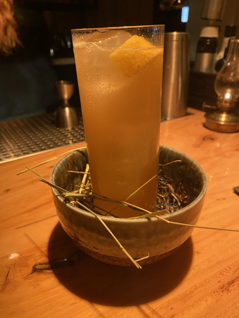 The High Horse cocktail is a bourbon creation that is served in a bowl of smoking hay. (Photo by Megan Ziots)