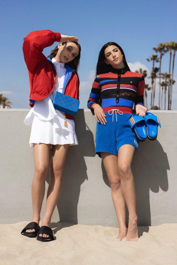 Dressed head-to-toe in Louis Vuitton, Emma Chamberlain and Charli' D'Amelio showcase the brand's LV Sunset mule. (Photo courtesy of Louis Vuitton)