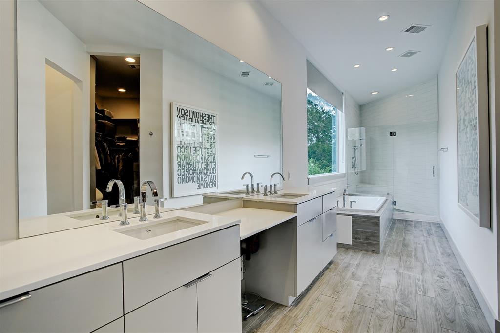No luxury is overlooked in the master bath of the Triangle House in The Heights.