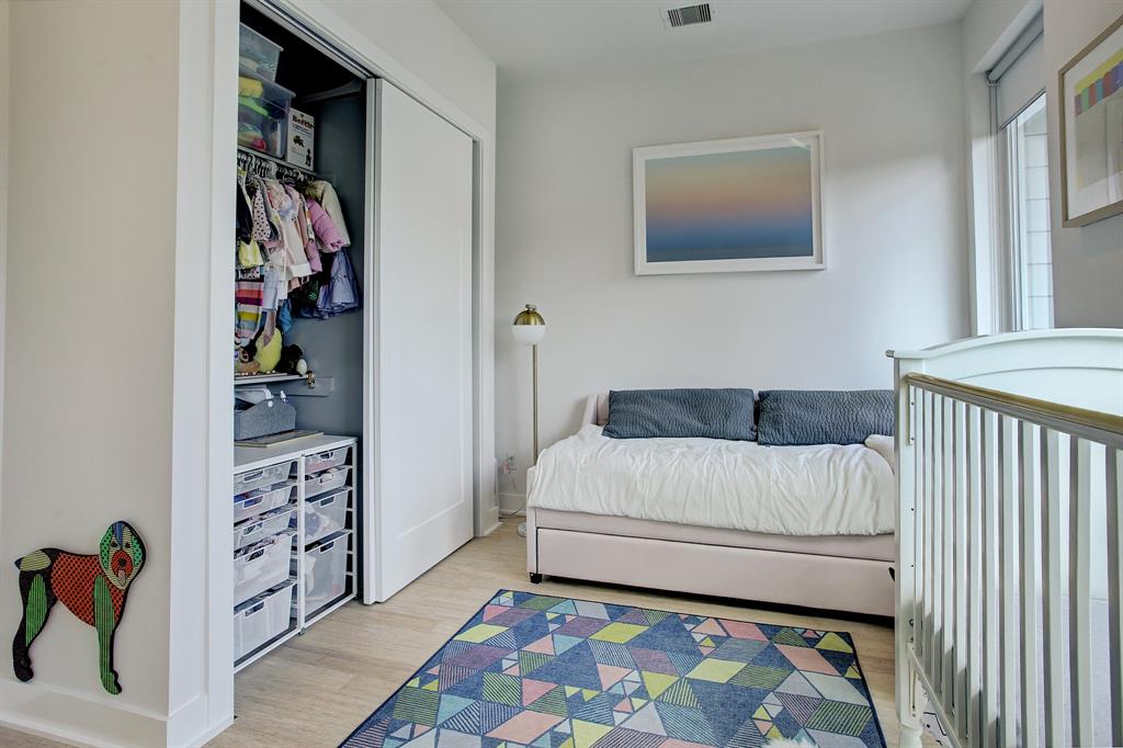 The second bedroom in the Triangle House in The Heights is currently used as a nursery.