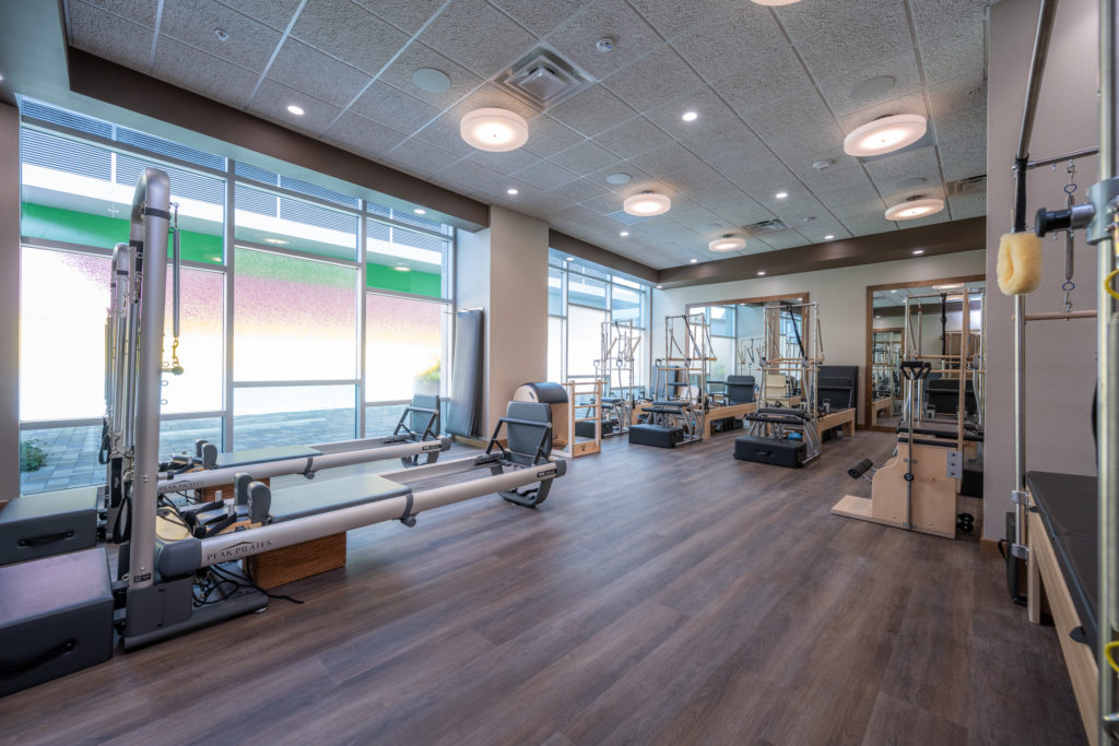 Inside the Pilates workout space at Life Time luxury health clubs. Members have access to cutting-edge equipment and studio classes.