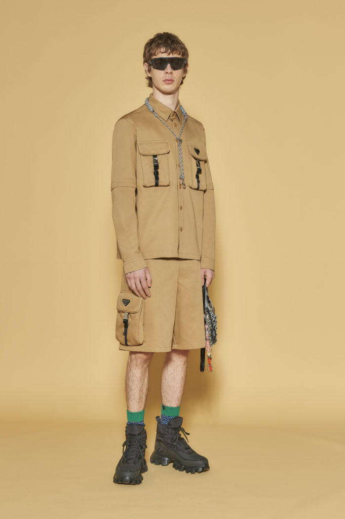 Prada shirt $1,430, sunglasses price available upon request, necklace $1,240, shoes $1,170 available at the Prada Aspen boutique through September 7 (photo courtesy of Prada)