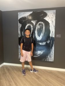 Manny Almodovar with Christie’s Artwork