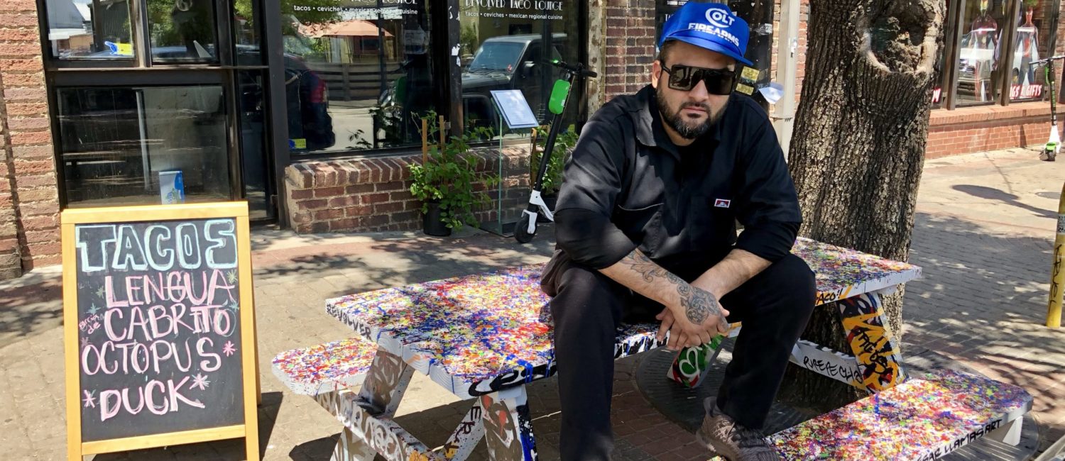 Regino-Rojas-in-front-of-his-Deep-Ellum-Revolver-Taco-Lounge-scaled