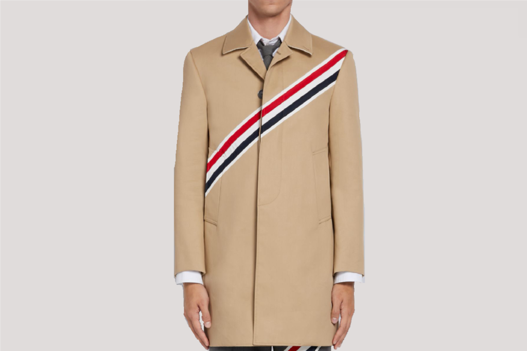 Thom Browne khaki cotton twill overcoat, $3,090, available at thombrowne.com and select Saks Fifth Avenue and Traffic LA stores