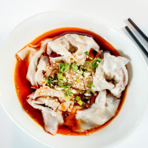 Wontons in chili sauce (Photo by Monika Normand)