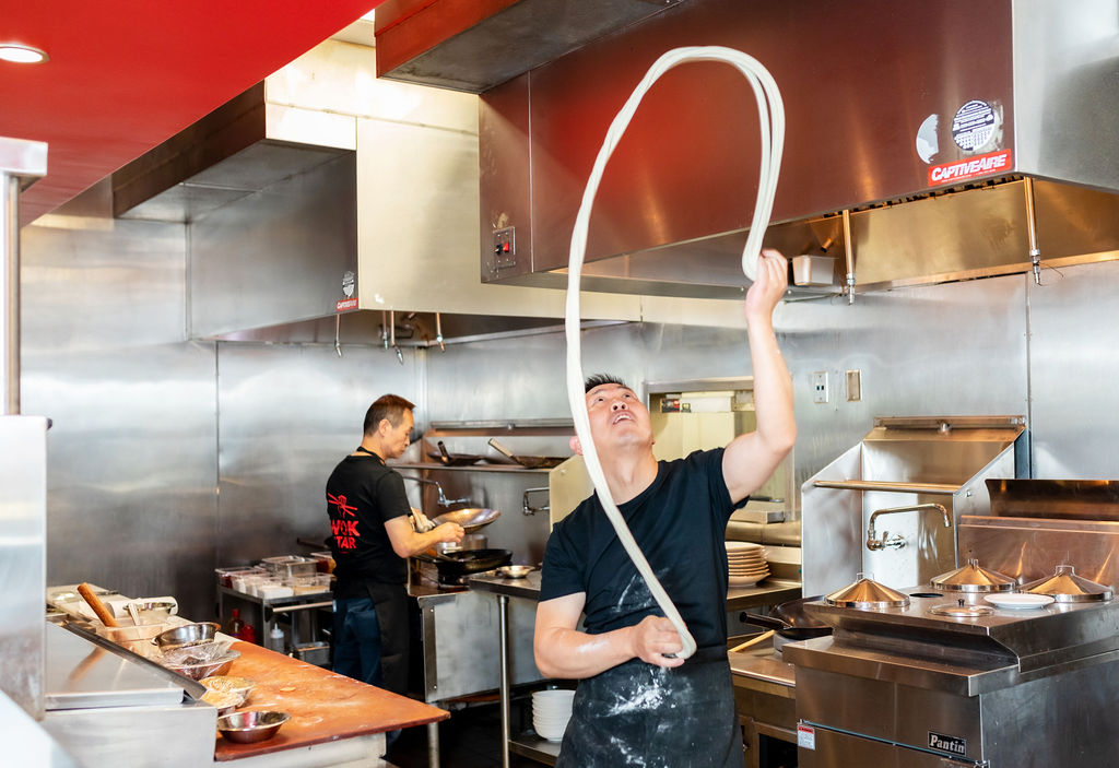 wok star chinese review Chef Charlie Zhang providing some noodle pulling entertainment (Photo by Monika Normand)