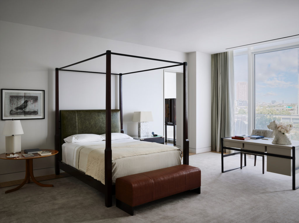 In the main bedroom, Holly Hunt bed, custom Gayle Warwick linens, London. Headboard in Keleen Leathers. Magni desk. (Photo by Douglas Friedman)