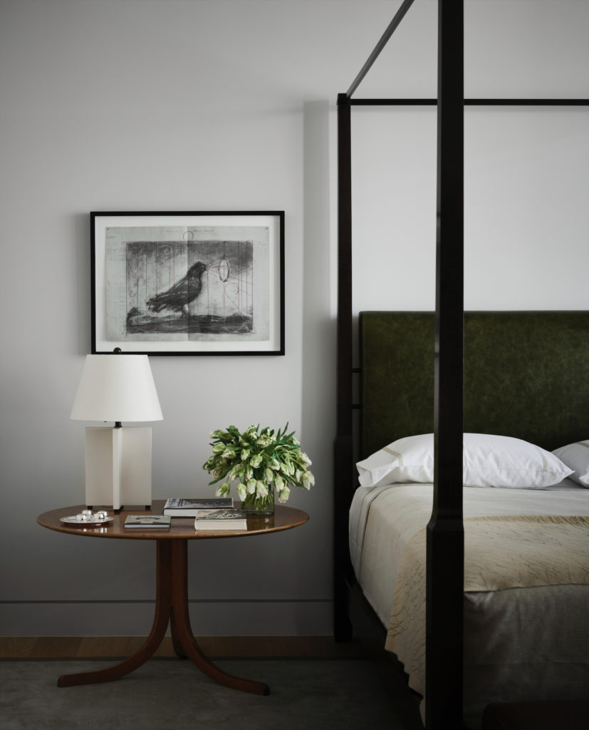 In the main bedroom, 1940 table by Josef Frank. Lamp by Mattaliano. William Kentridge's "Bird with Mirror" on paper. (Photo by Douglas Friedman)
