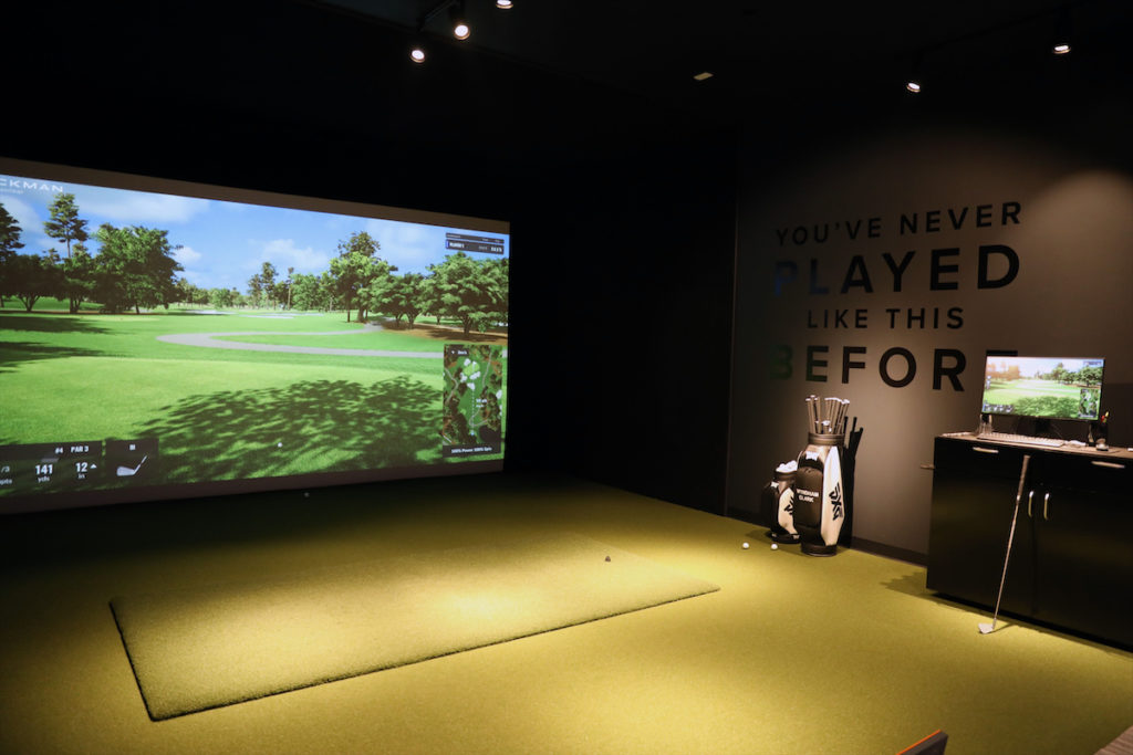 A simulation room within the PXG Dallas store features Trackman technology. (Photo by Rick Kern/Getty Images for PXG)