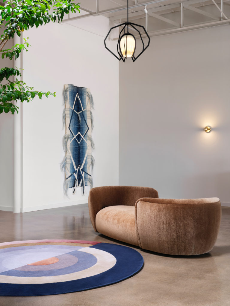 Sofa is Pierre Augustin Rose, Paris. Emma Boomkamp wall hanging, Mexico City. Light pendant is Bec Brittain, NY. Rug is CC-Tapis, Italy. (Photo by Lisa Petrole)