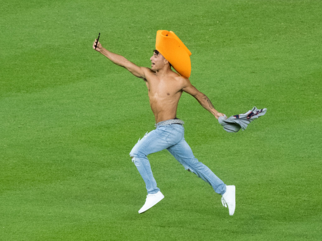 The shirtless cowboy took a selfie of himself while running. He'll likely be bared from Minute Maid Park. (Photo by F. Carter Smith)