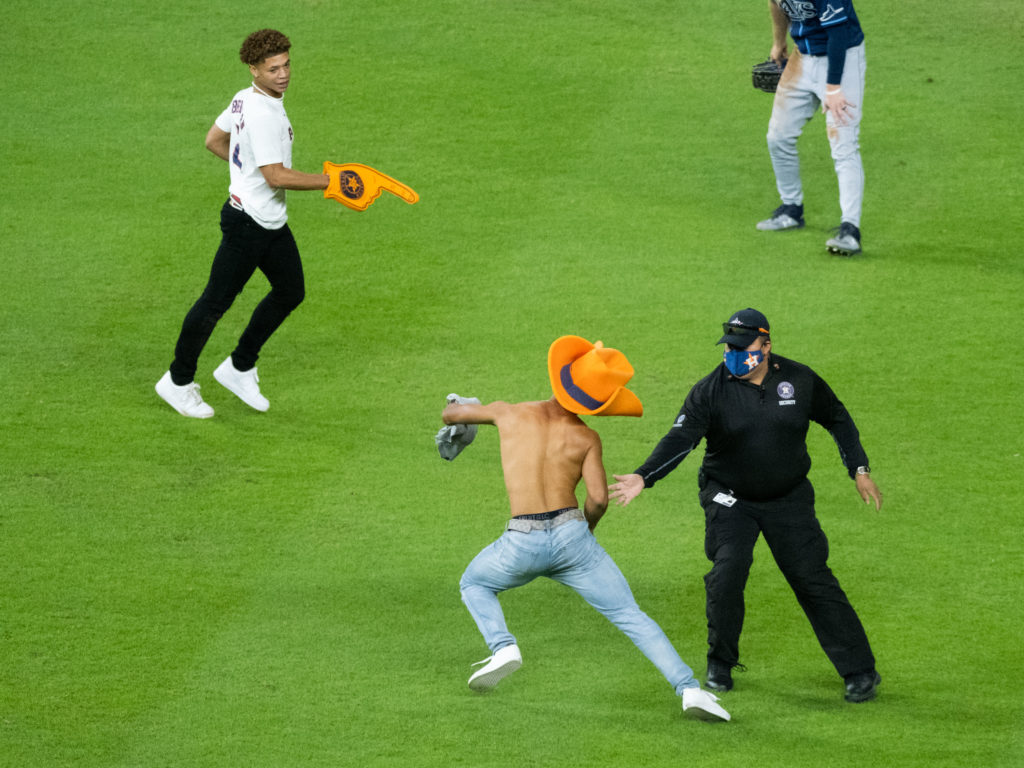 Two Astros fans ran onto the field and gave security quite the chase. (Photo by F. Carter Smith)