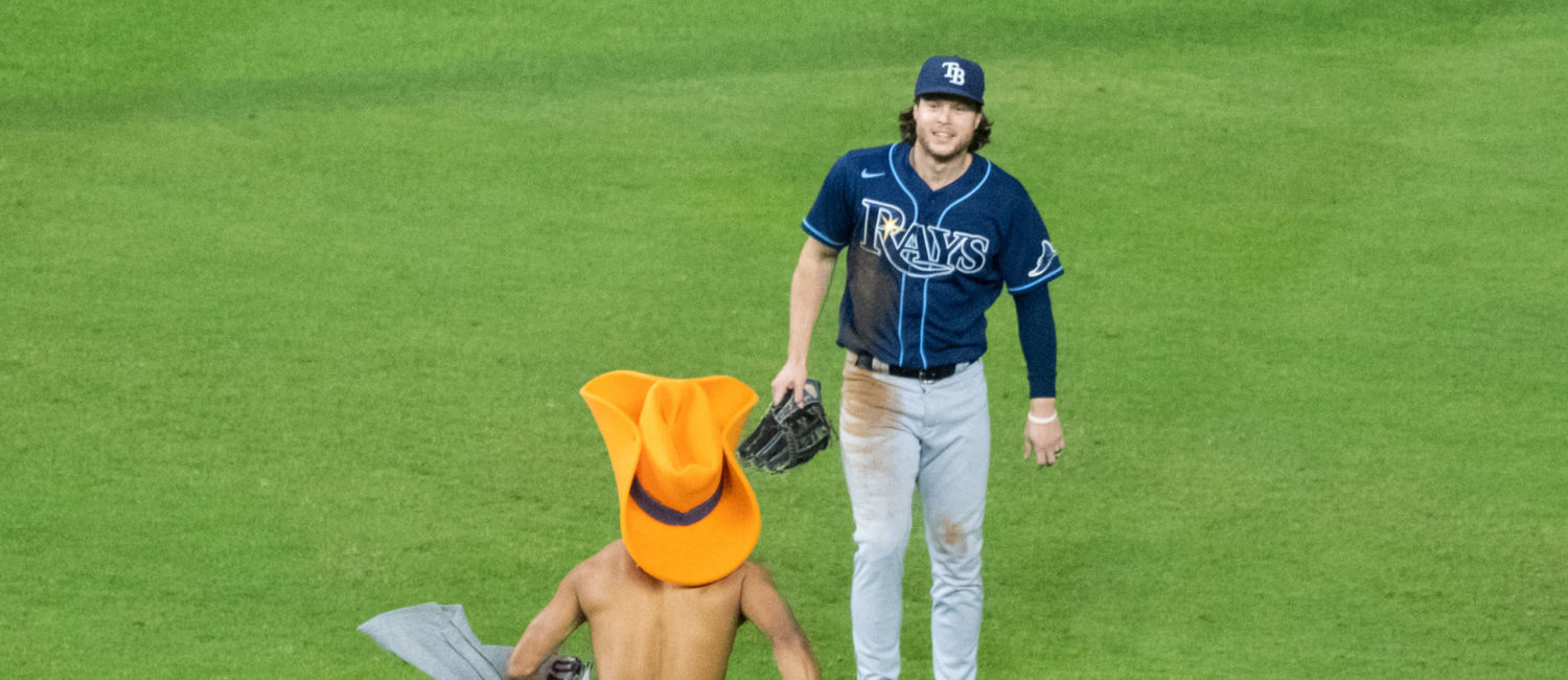Astros fan runs field cowboy