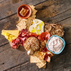 CM – Cheese wall featuring hundreds of domestic and imported cheeses is awe inspiring