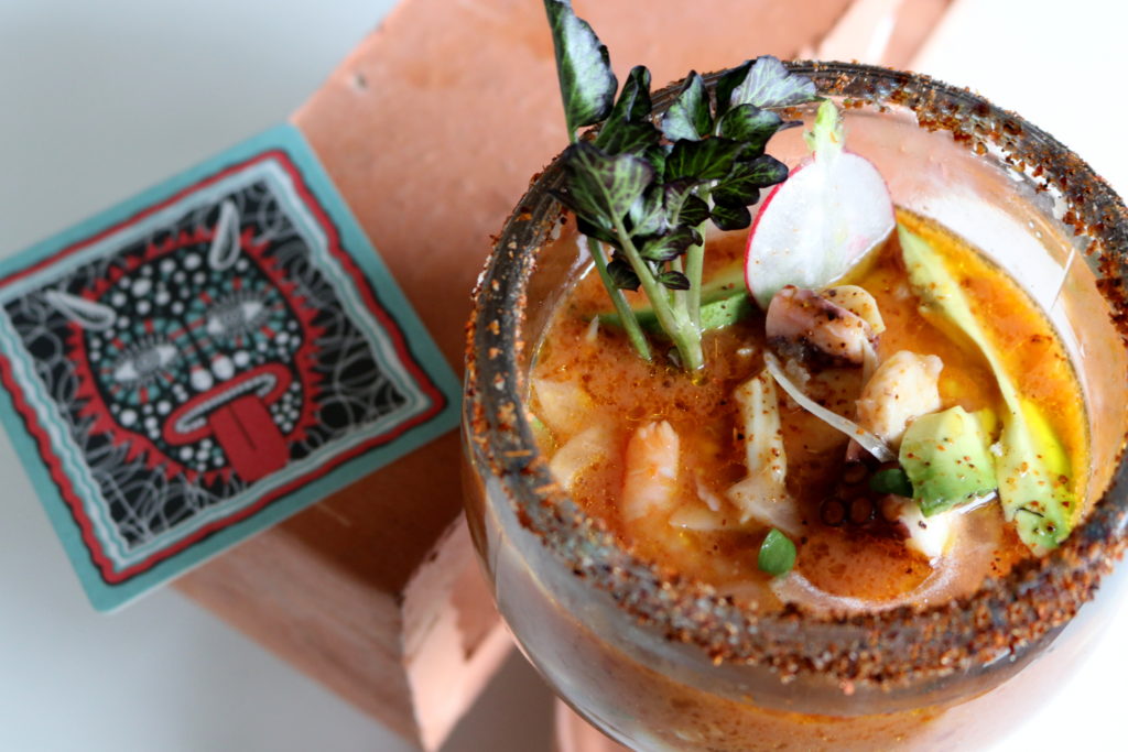 Their Campechana Estilo D.F. is a chilled seafood cocktail made with their not so secret ingredient, orange Fanta soda.(Photo by Paula Murphy)