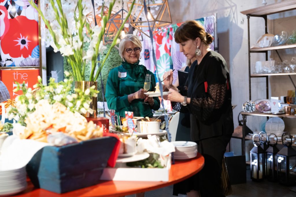 Elizabeth Swift Copeland introduces Shelby Hodge to new soufflé flavors at the tasting at Swift + Company. (Photo by Daniel Ortiz)