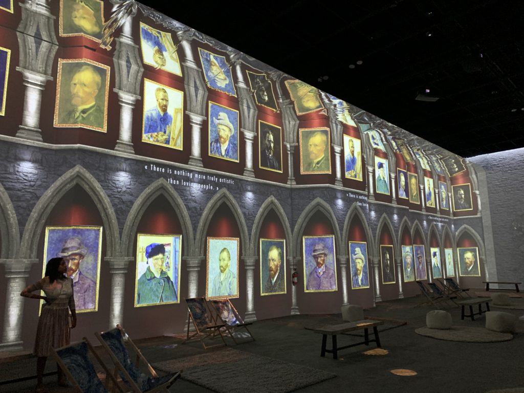 The exhibition recreates a museum experience with projections. (Photo by Tarra Gaines)