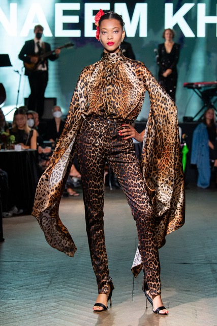 Naeem Khan Havana animal print hi-neck blouse with matching organic hemp jeans. (Photo courtesy of Naeem Khan)