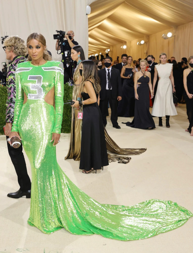 Ciara wears a lime green gown inspired by her husband, Seattle Seahawks quarterback's jersey, with his number 3 emblazoned on the front. (Instagram: @metmuseum)