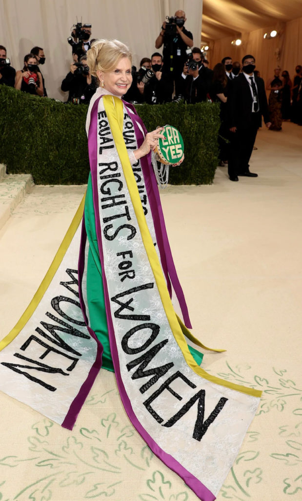 New York congresswoman Caroline Mahoney wears a gown in suffragette colors with Equal Rights for Women panels. (@Instagram: @metmuseum)