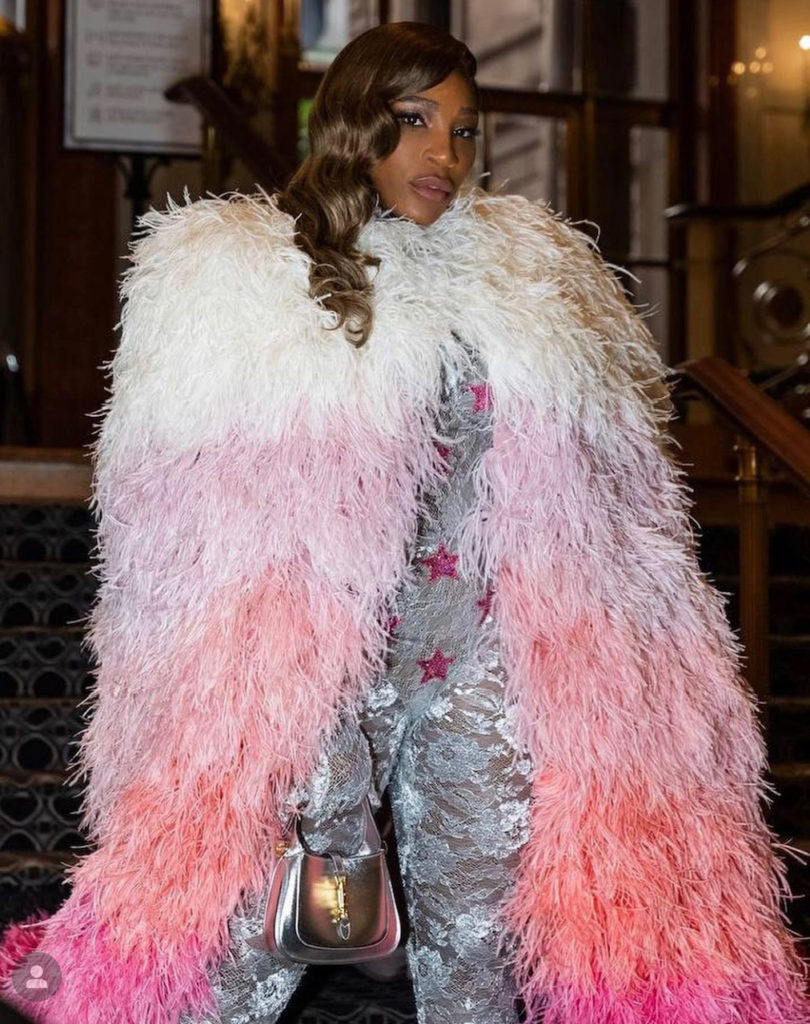 Serena Williams wears a Gucci bodysuit and elaborate feathered cape that reminded her of being a superhero. (Instagram: serenawilliams)