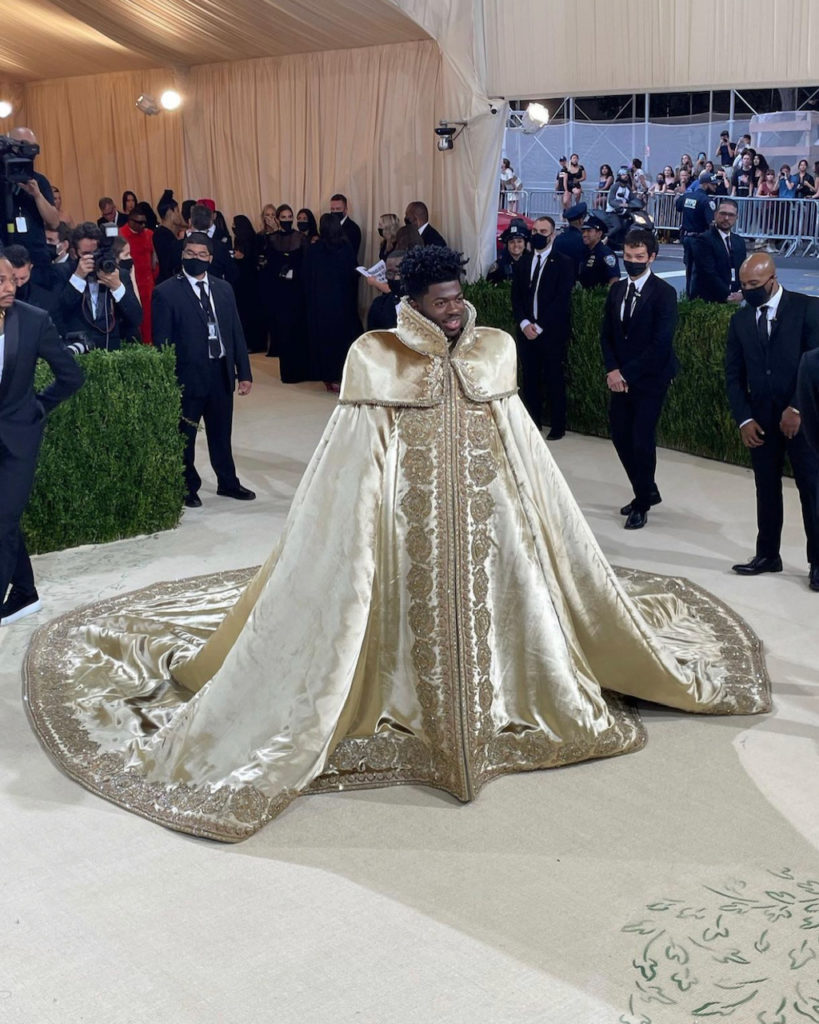 Lil Nas unveiled his Met Gala attire by Versace in three stages. Stage One: A golden cape. (Instagram: @lilnasx_)