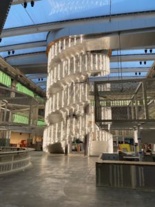 The Vladimir Tatlin-inspired staircase that anchors the 53,000 square foot food hall at POST Houston. (Photo by Shelby Hodge)