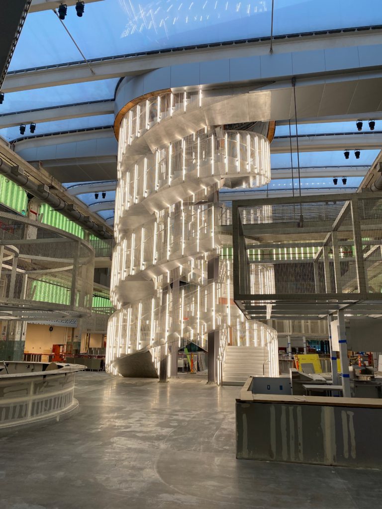 The Vladimir Tatlin-inspired staircase that anchors the 53,000 square foot food hall at POST Houston. (Photo by Shelby Hodge)