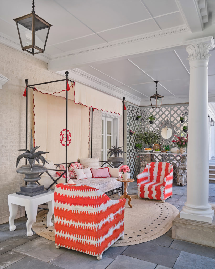 A sophisticated outdoor terrace and pool deck by Robin Henry Studio (Photo by Stephen Karlisch)