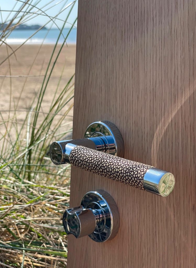 A door lever from Turnstyle Designs elevates any door.