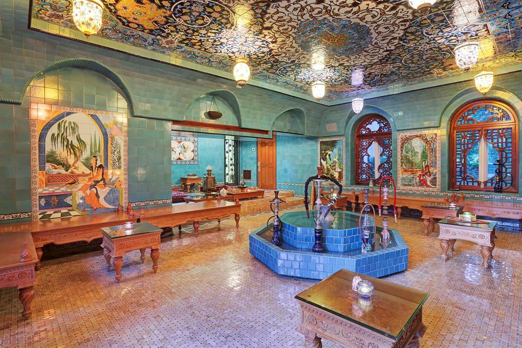 A formal Persian tea room in the home at 8823 Harness Creek Lane.