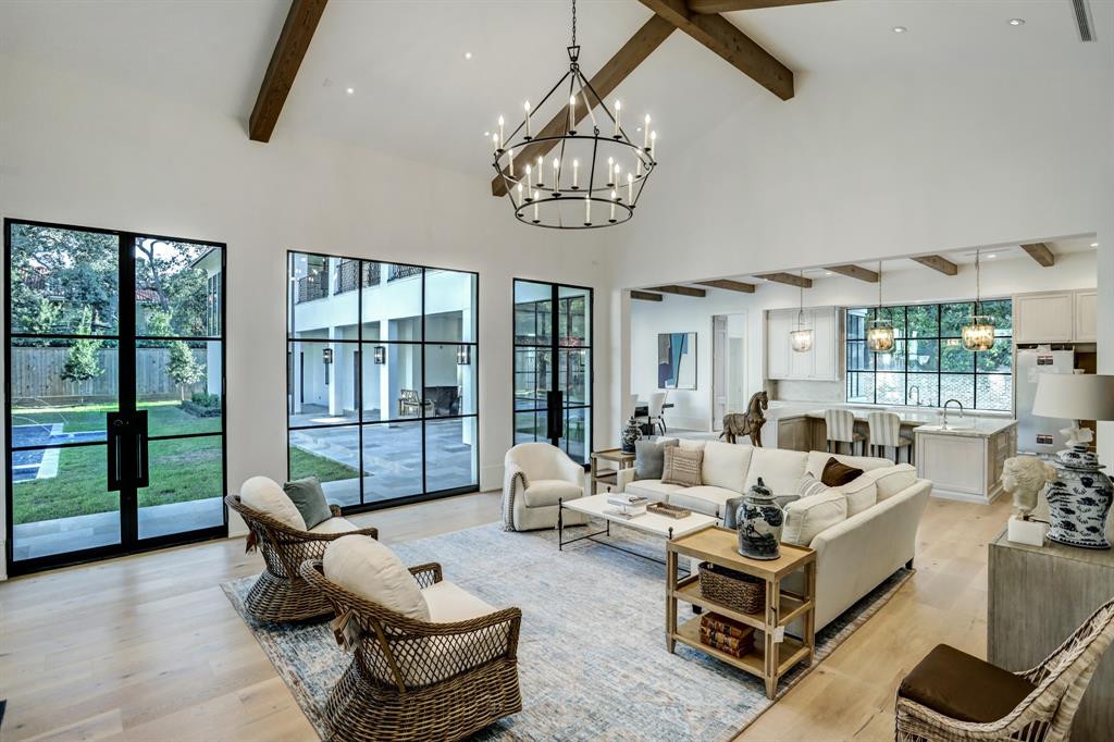 A second view to the family room at 3001 Inwood has 18 foot vaulted ceiling with beams. (Photo by TK Images)