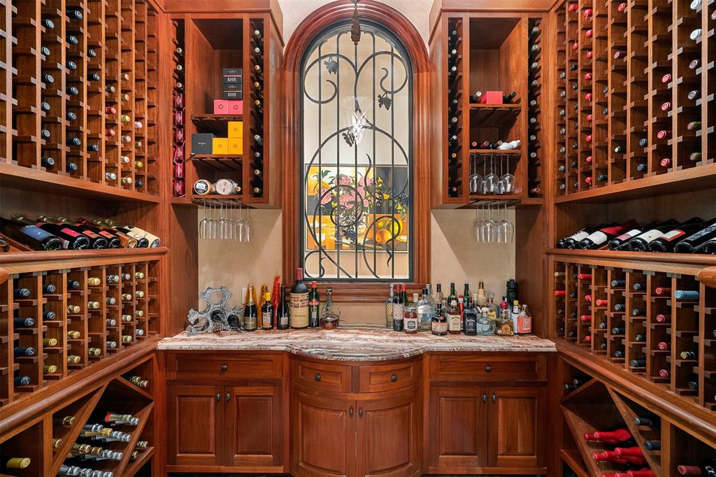 The 600-bottle wine room at 27 Grand  Regency Circle in The Woodlands.
